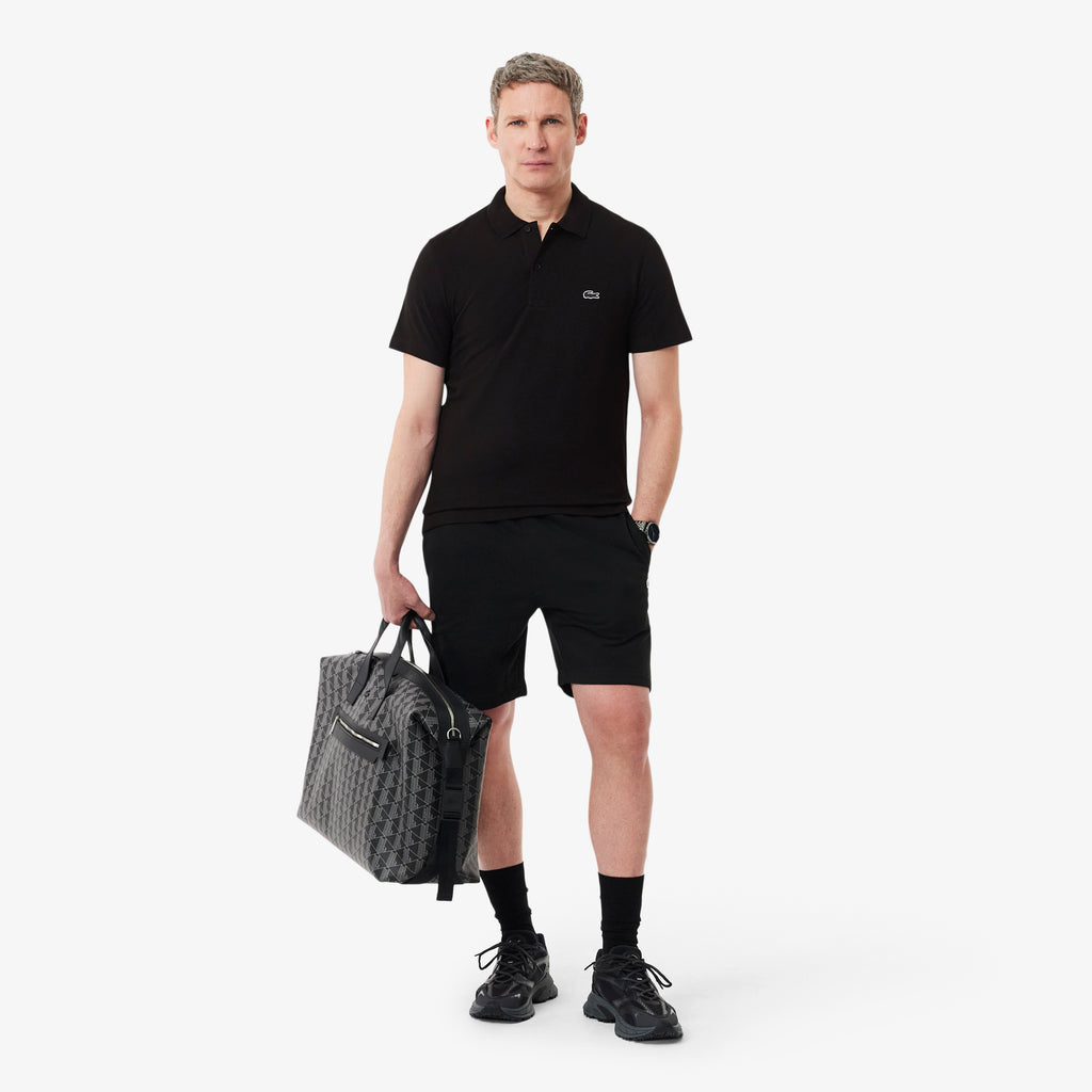 Polo de corte regular de algodón negro