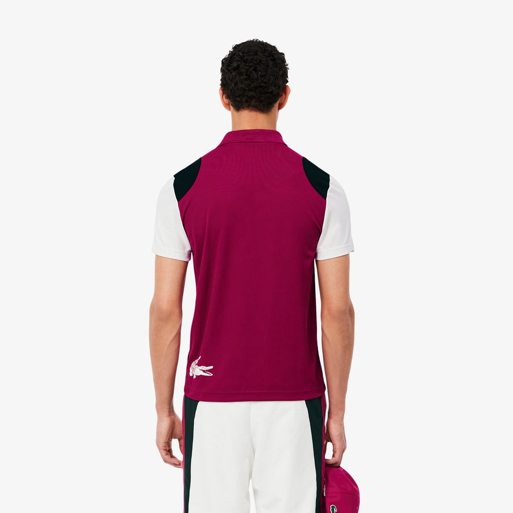 Polo deportivo con bloques de color Ultra Dry