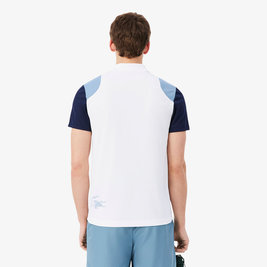 Polo deportivo con bloques de color Ultra Dry