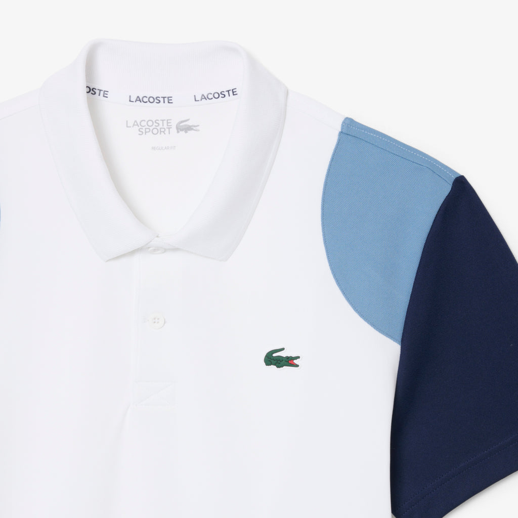 Polo deportivo con bloques de color Ultra Dry
