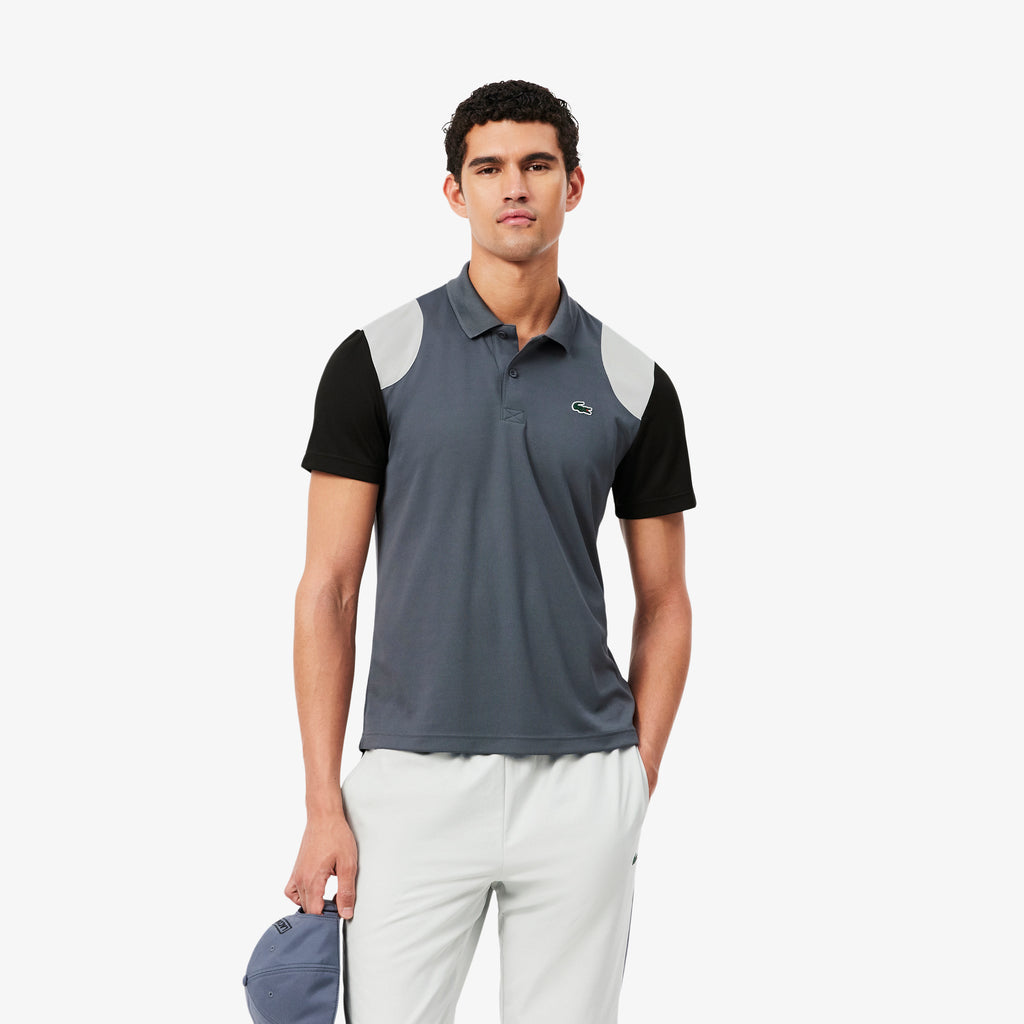 Polo deportivo con bloques de color Ultra Dry