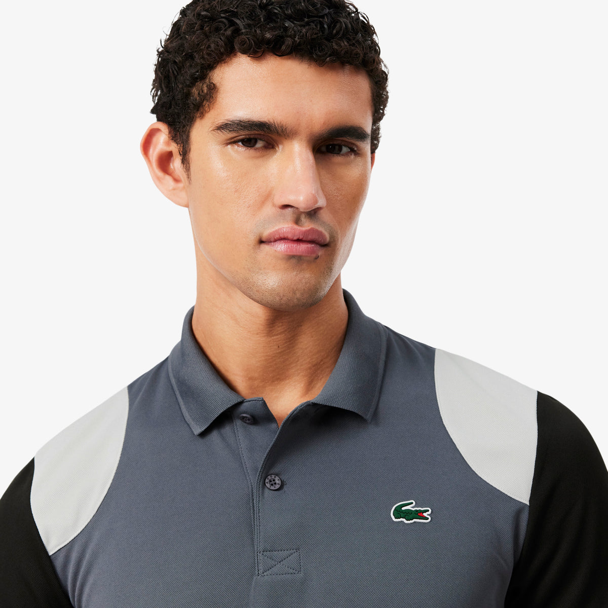 Polo deportivo con bloques de color Ultra Dry