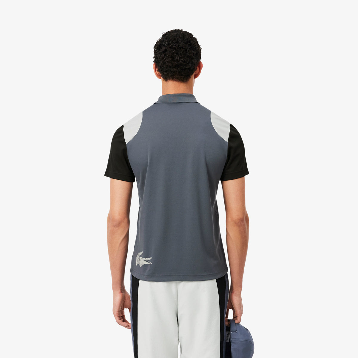 Polo deportivo con bloques de color Ultra Dry