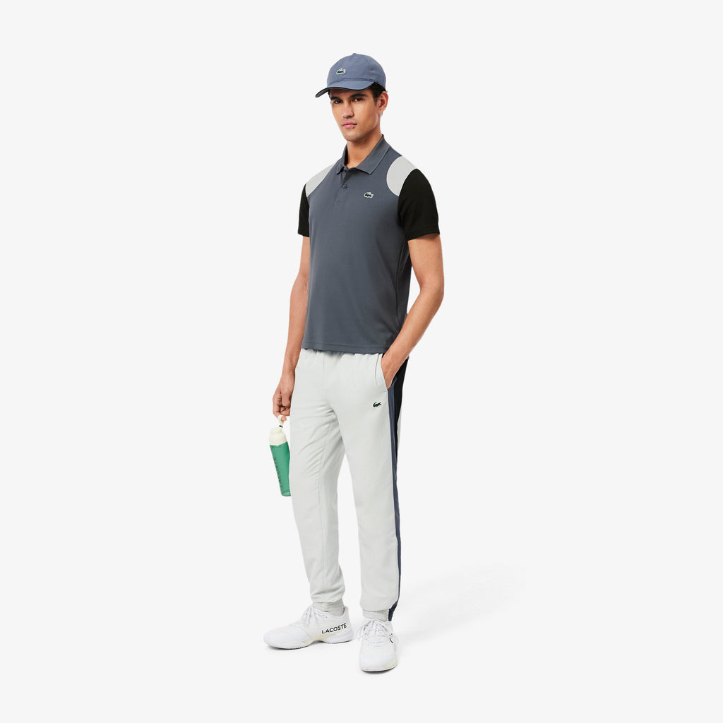 Polo deportivo con bloques de color Ultra Dry
